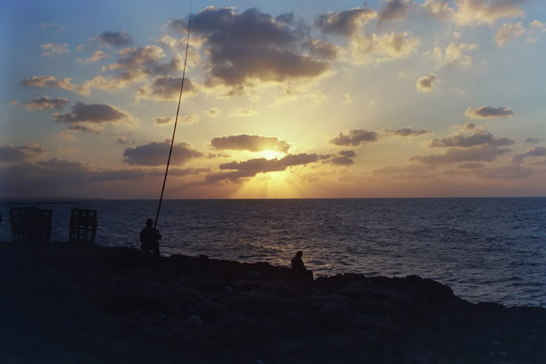 Sunset Fishing in Alexandria - by: Aymen Ibrahem (Zenith 200mm, F22, 1/500 second exposure, Kodak Ultra 400)