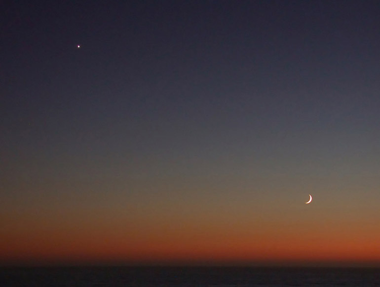 Crescent Moon and Venus Over Pacific