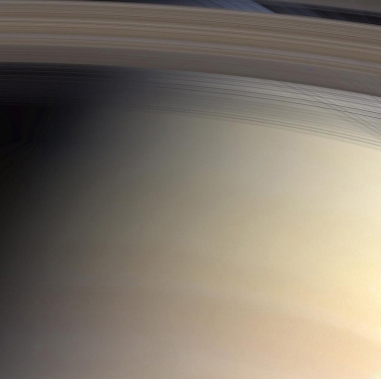 A close-up of the C-Ring seen against Saturn.