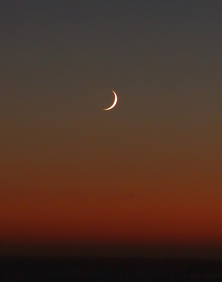 Crescent Moon Over Pacific - Close-Up